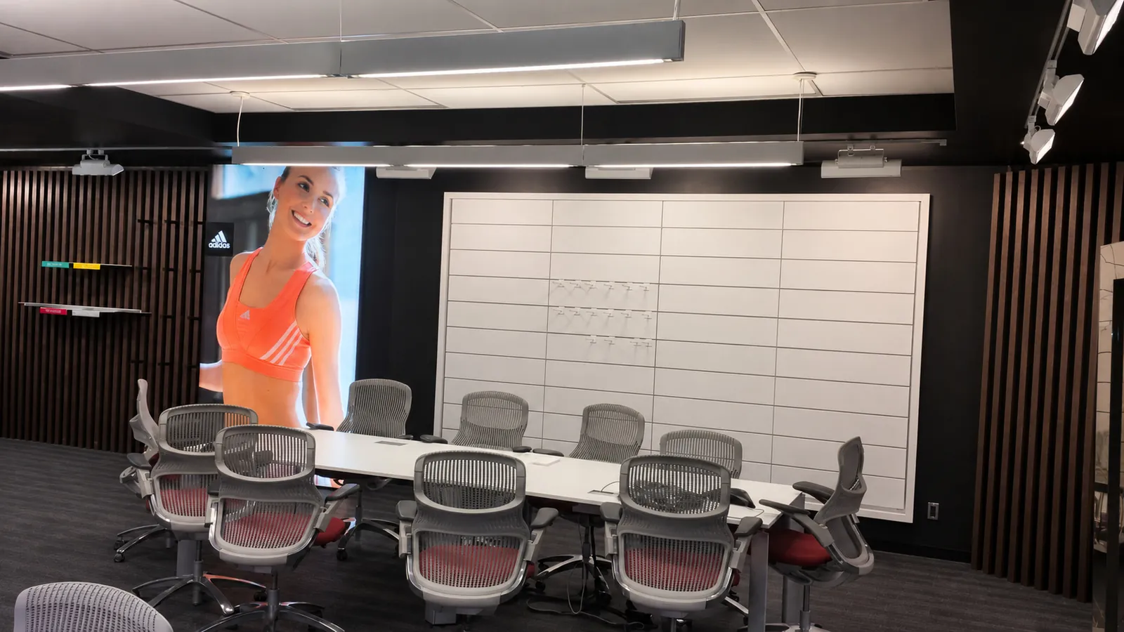 Adidas — boardroom with slatted wall and display screen