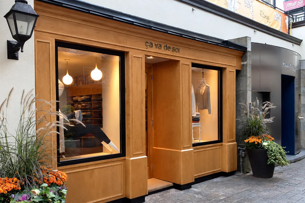 Ça va de soi boutique on Cumberland Street in Yorkville, with a custom wood storefront built by Benchmark