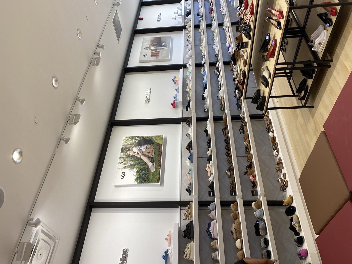 Full store interior — shoe wall and displays