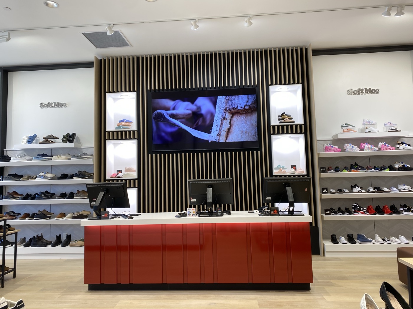 POS counter with slatted wood feature wall