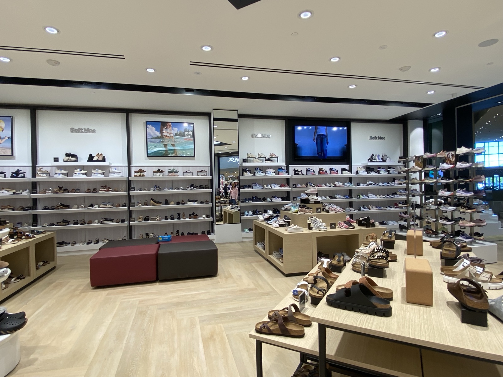 SoftMoc Square One — custom shoe wall display and seating